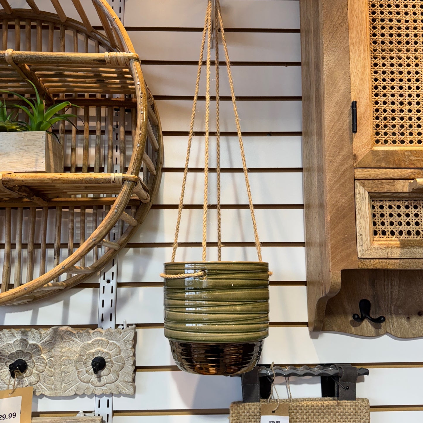 Suspended pot striped green planter