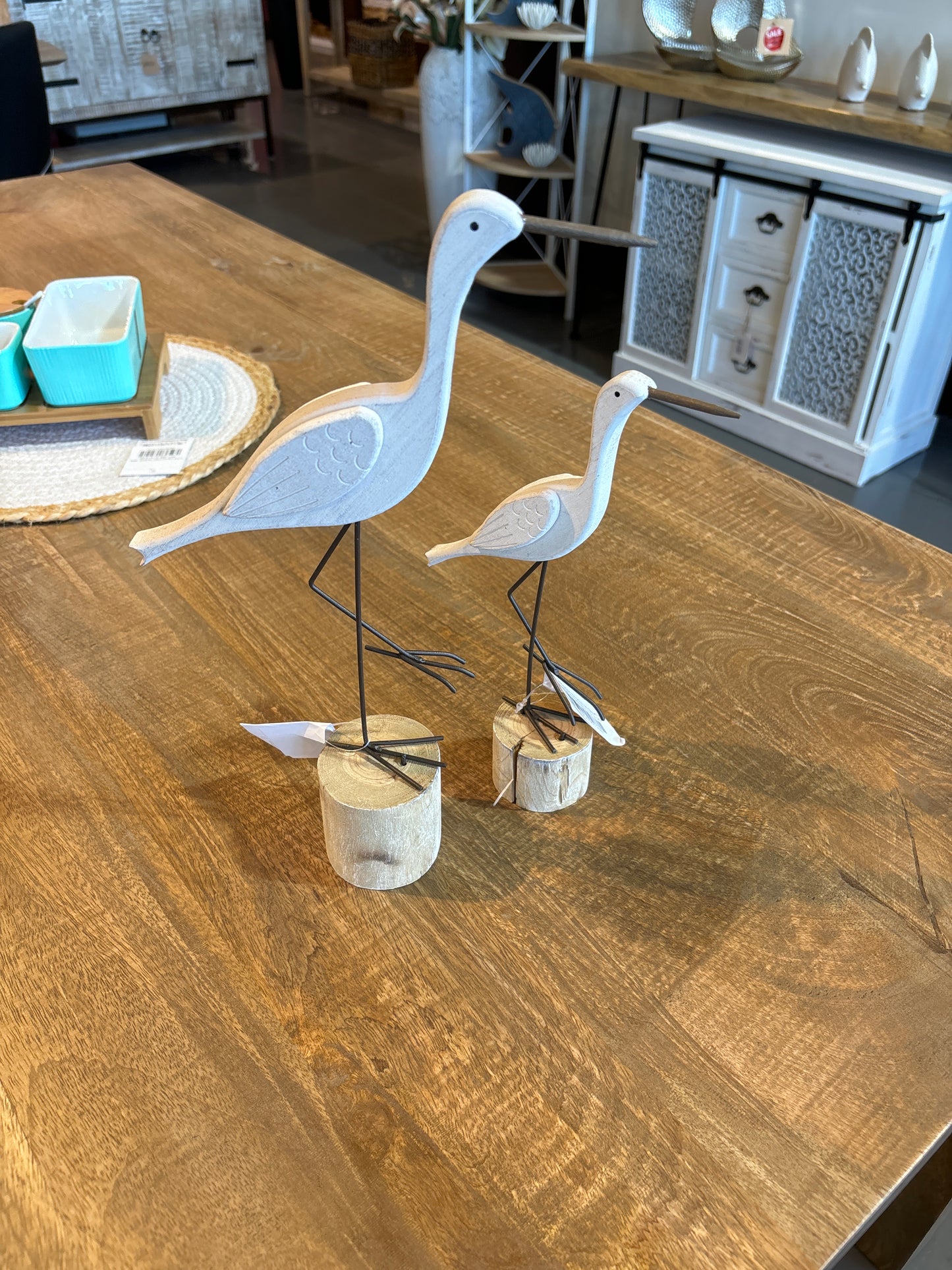 Wooden Storks on Stump