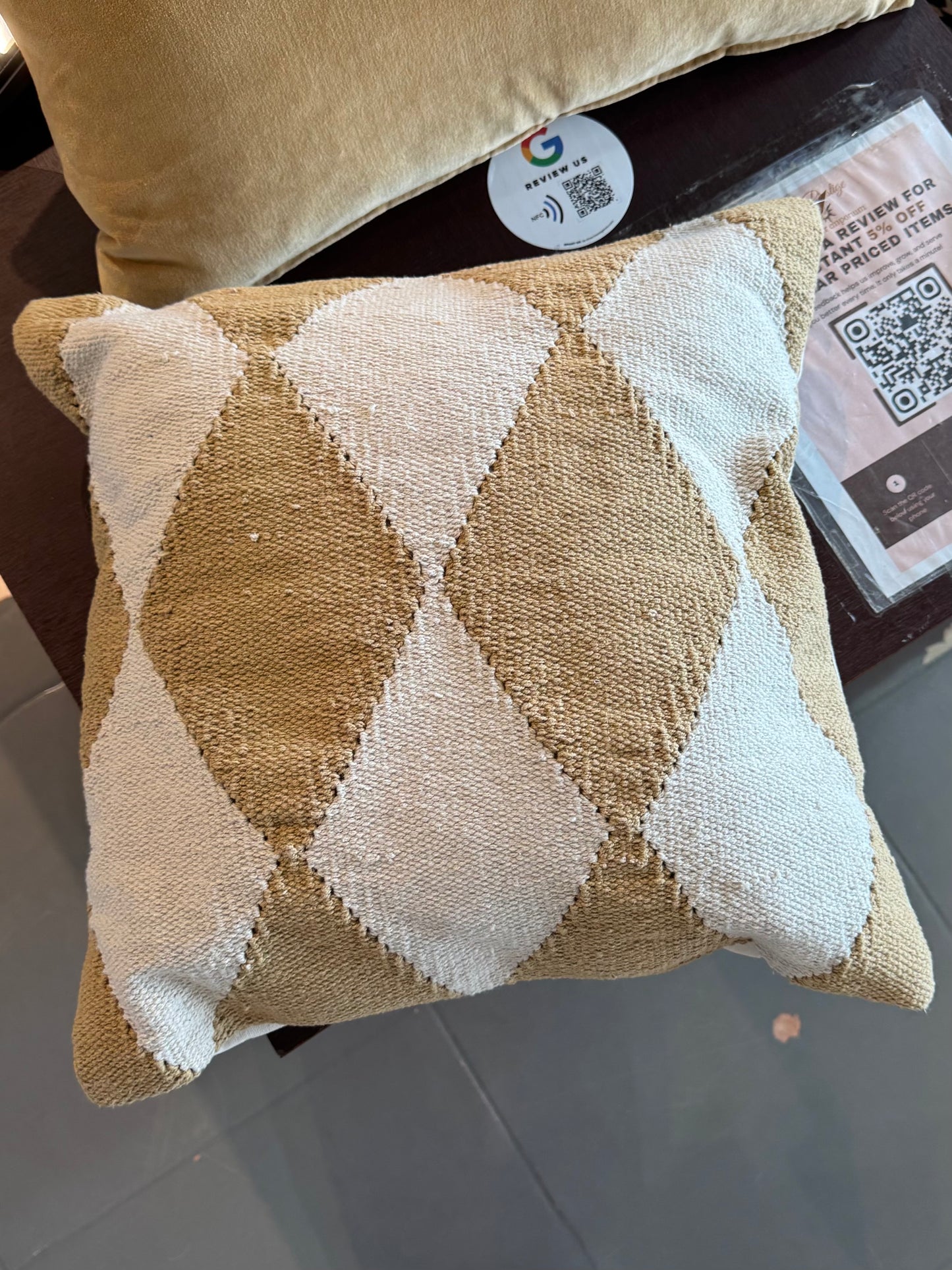White beige diamond patterned pillow