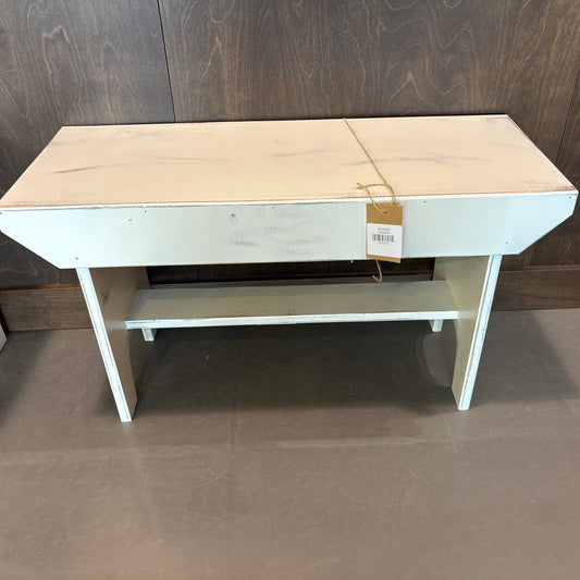 Light-colored wooden bench made in Canada
