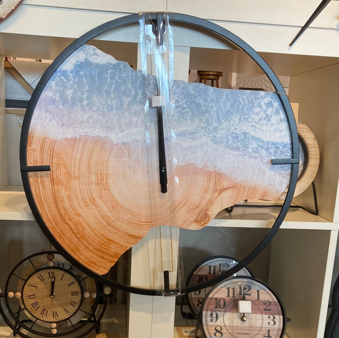 Circular clock sand/sea theme