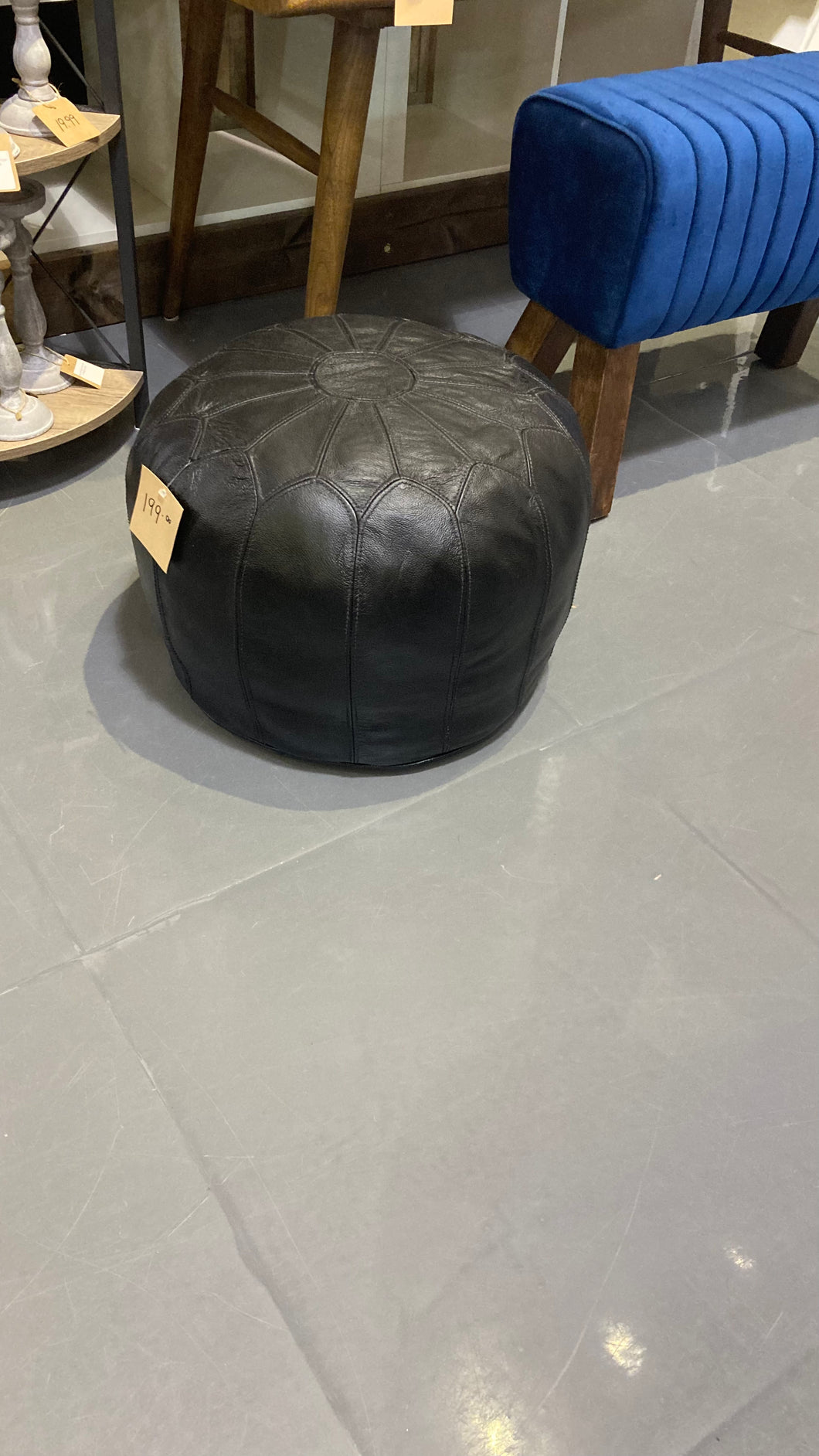 Dakota Black leather round ottoman