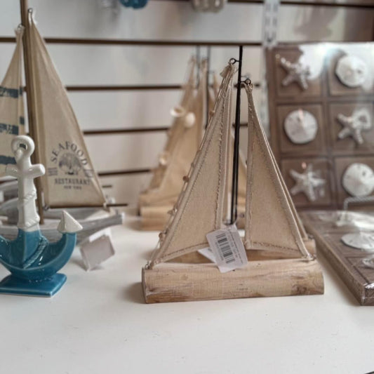 Simple Wooden Sailboat with canvas sails