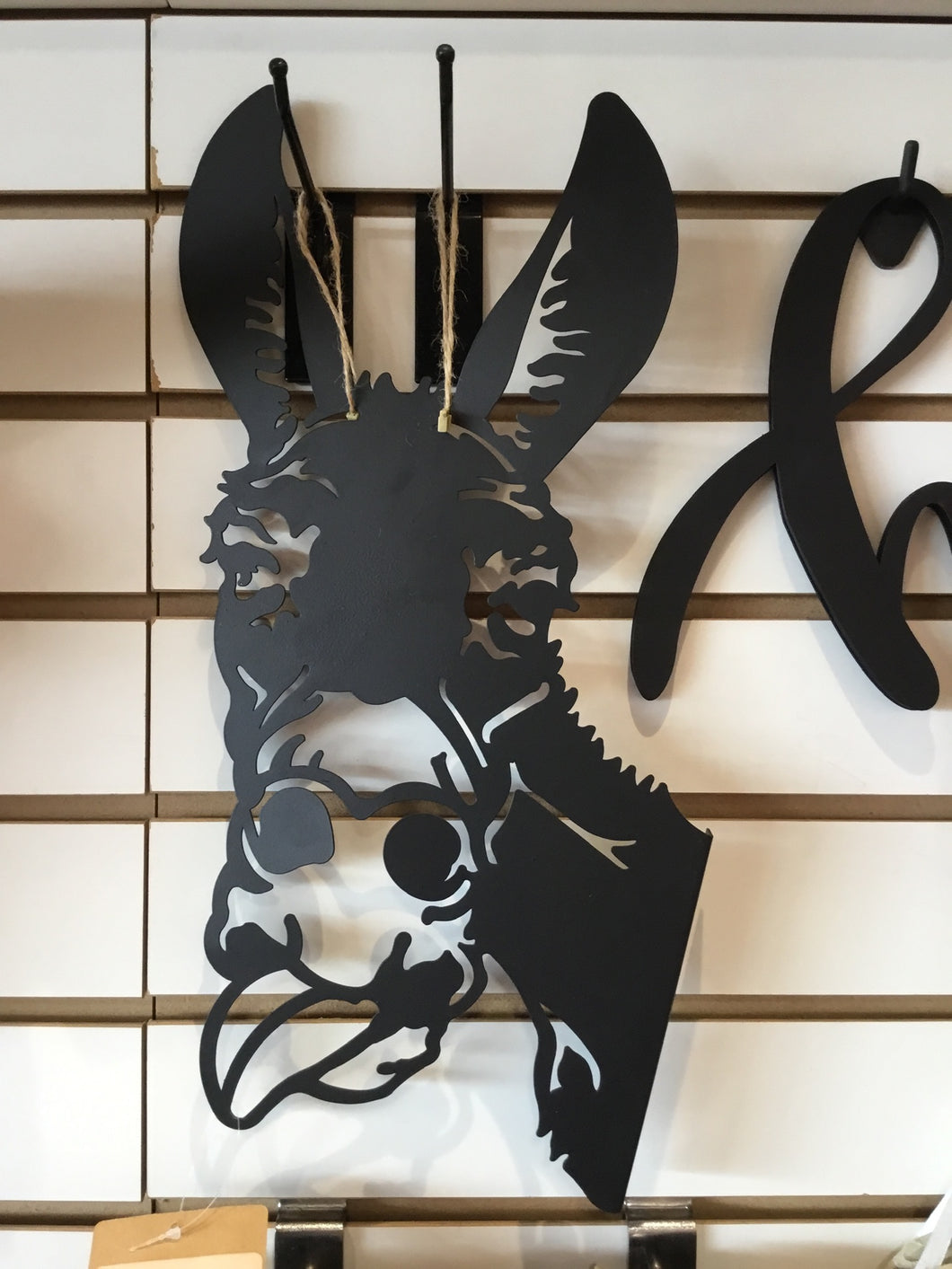 Black Metal Tongue Out Donkey Wall Art